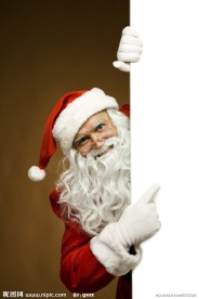 手指着空白广告牌的圣诞老人