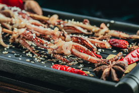 鱿鱼须烧烤高清摄影图