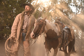 牛仔牵马