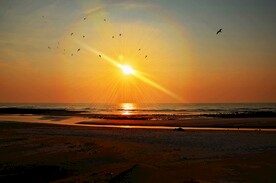 海滩日出日落摄影