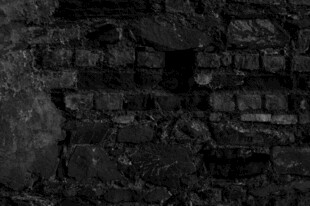 老旧深色砖墙纹理特写