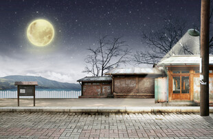 雪夜小屋月光下的静谧