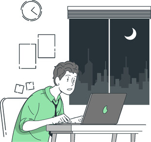 深夜伏案工作的年轻男子