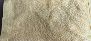 黄色毛巾纹理特写