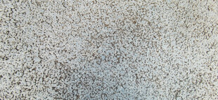 浅灰色砂石纹理背景图