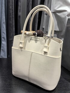 米白色时尚手提女士包包