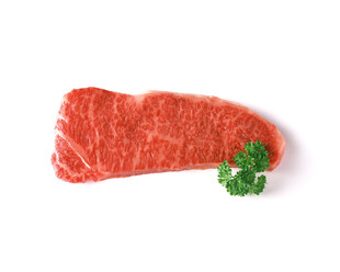 新鲜牛肉块配绿色香草