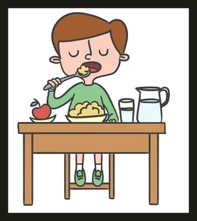 男孩享用丰盛早餐