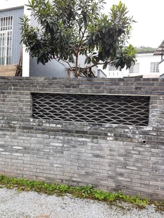 中式砖墙镂空窗景观