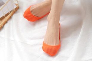 橙色平底鞋搭配女性美足