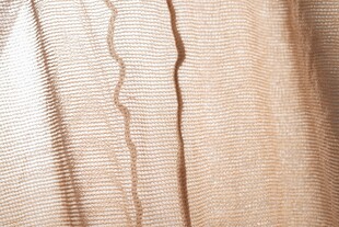 米色丝袜布料纹理特写