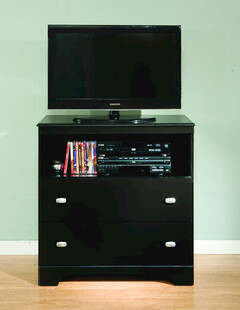 黑色电视柜上的老式电视机