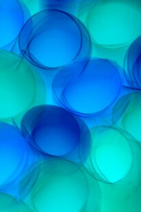 蓝绿 变圆形图案背景