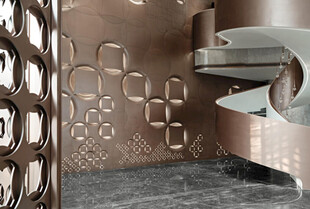 金属螺旋楼梯与镂空墙面