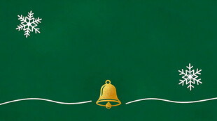 绿色背景上的圣诞铃铛