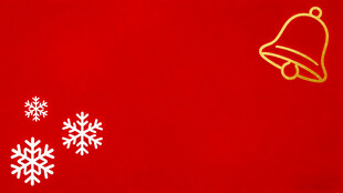 红色背景上的铃铛与雪花