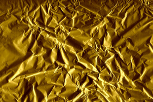 金色褶皱纹理背景图
