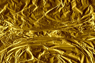 金色褶皱纹理金属质感图