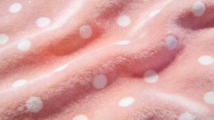 粉色波点柔软织物纹理