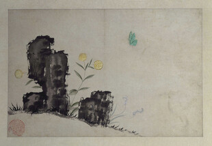 水墨山石间的灵动小花