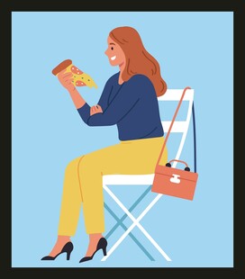 女子坐椅享用披萨