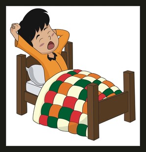 男孩在床上惬意伸懒腰