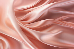 柔滑粉色绸缎纹理特写