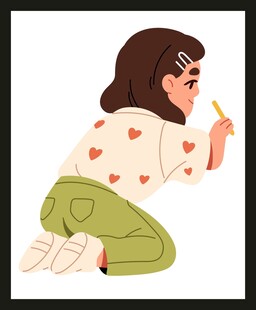 女孩跪地专注写字