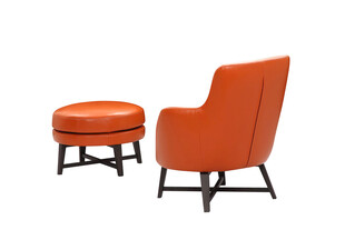 橙色时尚单人沙发与脚凳
