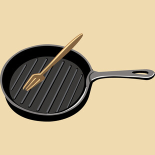 铸铁煎锅配木铲特写