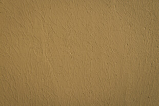 浅棕色墙面纹理背景图