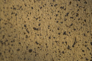 斑驳棕黄石材纹理特写