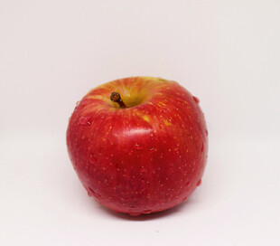 鲜红饱满的单个红苹果