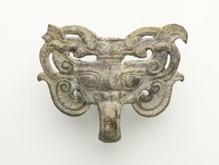 青铜兽面衔环饰