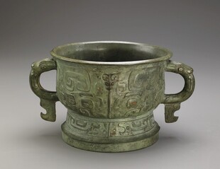 双柄青铜古容器