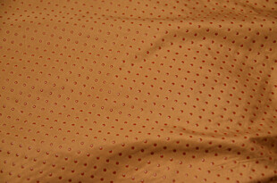 棕色穿孔皮革纹理特写