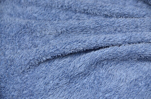 蓝色毛绒织物纹理特写