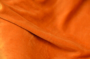橙色柔软织物纹理特写