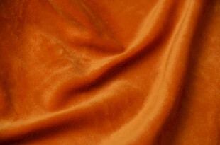 橙色柔软丝绒面料特写