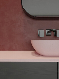 粉色墙面下的简约洗手台