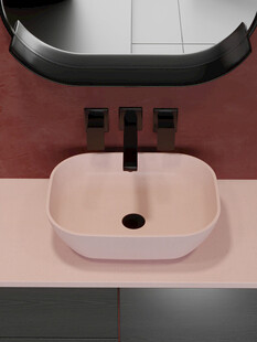 粉色洗手盆搭配黑色龙头