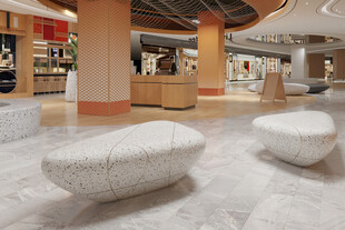 商场内独特造型的休息石凳