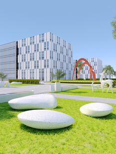 现代建筑旁的草坪景观装置