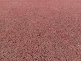红色颗粒地面特写
