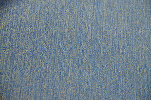 蓝色牛仔纹理布料特写