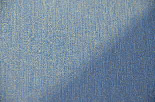 蓝色牛仔纹理布料特写