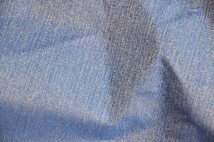 蓝色褶皱布料纹理特写