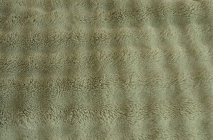 纹理丰富的浅棕色织物表面