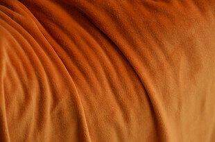 橙色褶皱毛绒 布料纹理特写