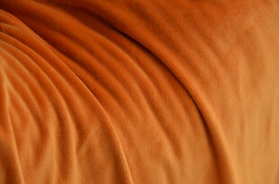 橙色毛绒 褶皱布料纹理特写